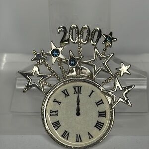 Silver and White Starburst Brooch with Roman Numeral Design